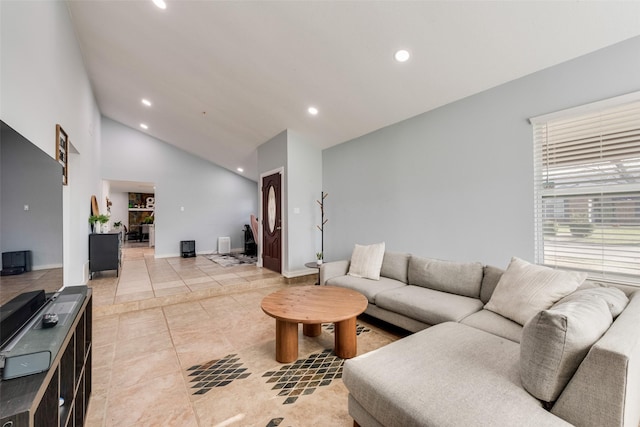 5102 Galaxie Rd, Garland, TX 75044 - living room featuring recessed lighting, lofted ceiling, and light tile patterned flooring