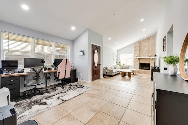 5102 Galaxie Rd, Garland, TX 75044 - office featuring light tile patterned floors, healthy amount of natural light, a fireplace, recessed lighting, and high vaulted ceiling