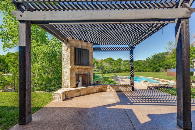 view of patio featuring an outdoor stone fireplace and a pergola
