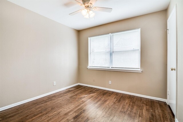 unfurnished room featuring wood finished floors, baseboards, and ceiling fan