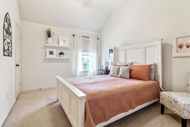 bedroom featuring lofted ceiling, light carpet, and baseboards