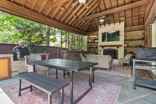 view of patio / terrace featuring fence, outdoor dining space, grilling area, and a ceiling fan
