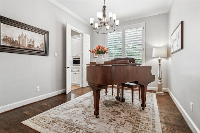 sitting room featuring baseboards, wood finished floors, a notable chandelier, and crown molding