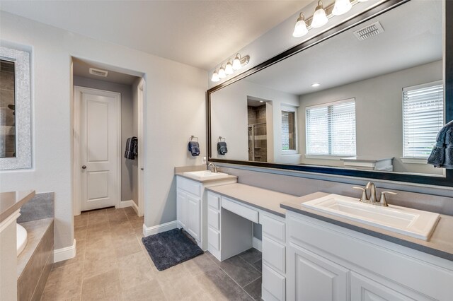 full bath featuring a bath, a sink, double vanity, and a stall shower