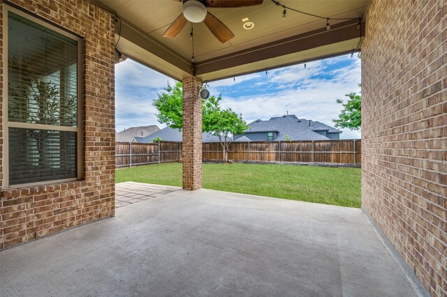 view of patio / terrace with ceiling fan and a fenced backyard