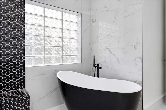 422 Mustang Dr, Sunnyvale, TX 75182 - bathroom with a freestanding tub and a tile shower