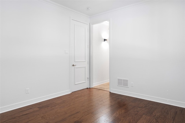 422 Mustang Dr, Sunnyvale, TX 75182 - spare room featuring wood finished floors, baseboards, ornamental molding, and a smoke detector