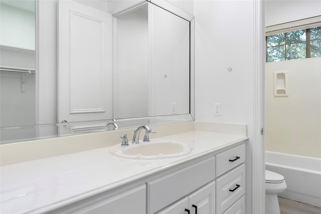 422 Mustang Dr, Sunnyvale, TX 75182 - full bathroom featuring vanity, toilet, and wood finished floors