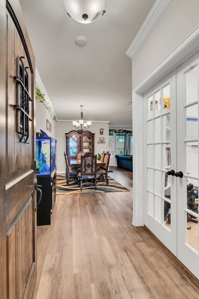 1728 Rio Secco Dr, Fort Worth, TX 76131 - foyer entrance featuring an inviting chandelier, light wood-type flooring, crown molding, and french doors