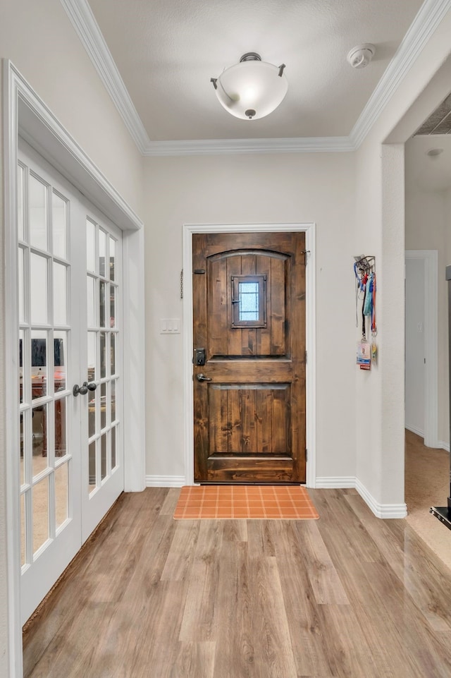 1728 Rio Secco Dr, Fort Worth, TX 76131 - entryway featuring baseboards, wood finished floors, and ornamental molding