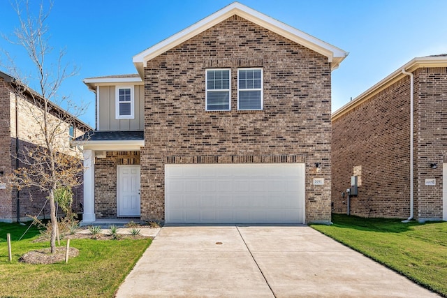 traditional-style home with brick siding, a front yard, board and batten siding, and a garage
