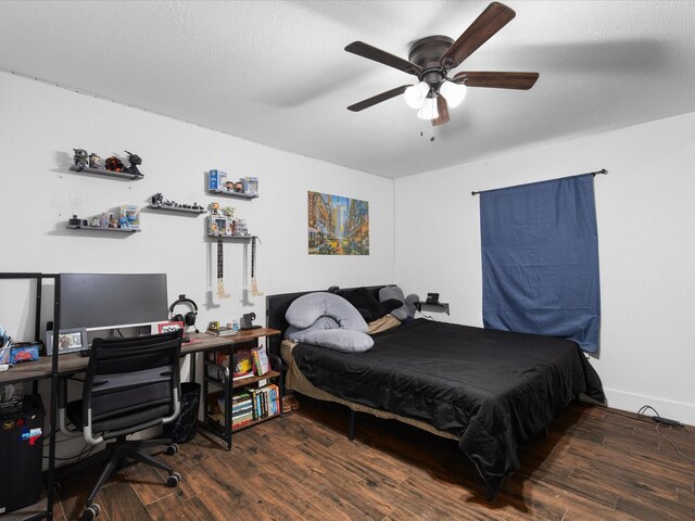 bedroom featuring ceiling fan and wood finished floors