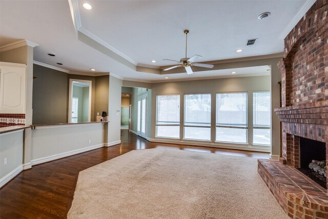 1405 Chesapeake Dr, Plano, TX 75093 - living room with a ceiling fan, wood finished floors, a tray ceiling, recessed lighting, and a fireplace