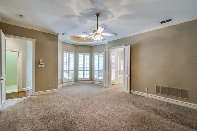 1405 Chesapeake Dr, Plano, TX 75093 - spare room featuring ornamental molding, a ceiling fan, light carpet, baseboards, and a smoke detector