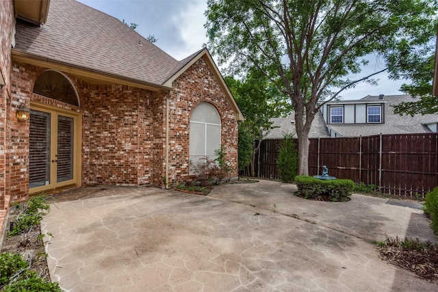 1405 Chesapeake Dr, Plano, TX 75093 - view of patio / terrace with fence and french doors