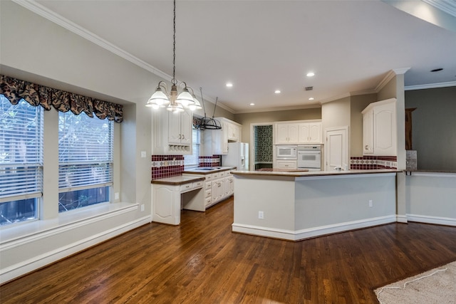 1405 Chesapeake Dr, Plano, TX 75093 - kitchen featuring white appliances, dark wood-style floors, white cabinetry, decorative backsplash, and ornamental molding