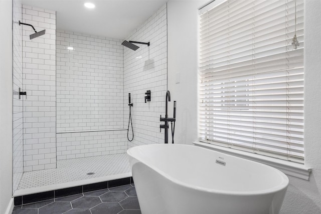 3319 Sheffield Dr, Arlington, TX 76013 - bathroom with a tile shower, tile patterned flooring, a soaking tub, and recessed lighting