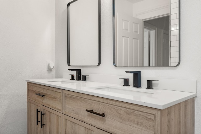3319 Sheffield Dr, Arlington, TX 76013 - bathroom with double vanity and a textured wall