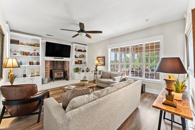 dining area featuring a healthy amount of sunlight, a notable chandelier, and baseboards