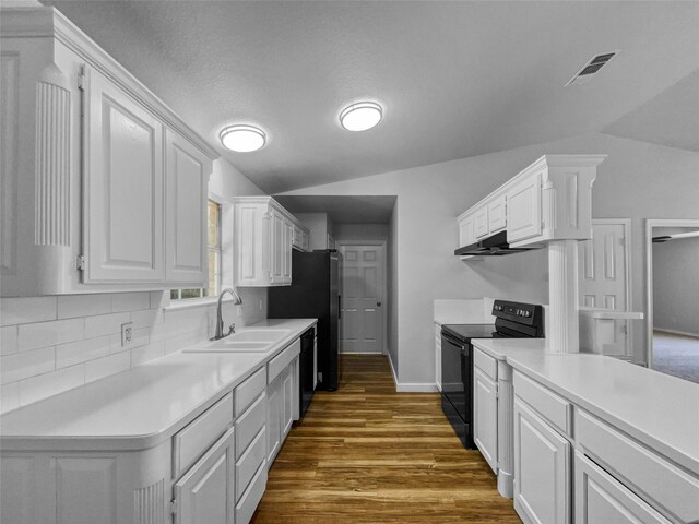 316 W 3rd Ter, Springtown, TX 76082 - kitchen featuring black appliances, lofted ceiling, a sink, and white cabinets