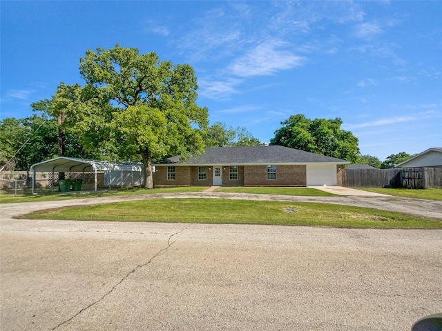316 W 3rd Ter, Springtown, TX 76082 - single story home with fence, a carport, a front yard, and concrete driveway