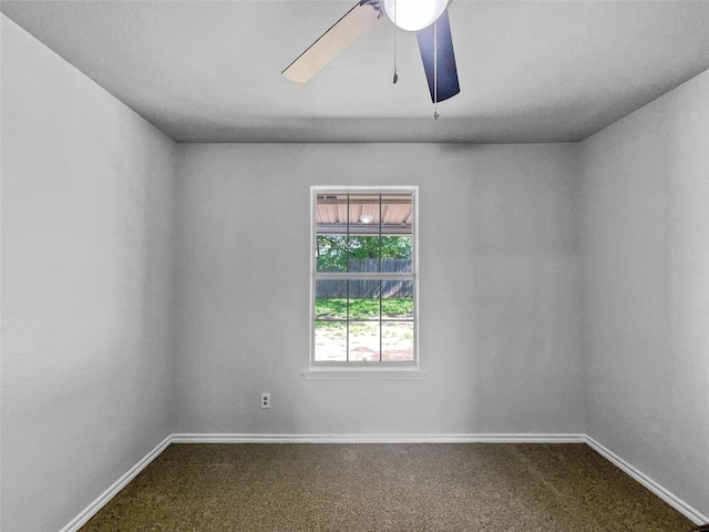 316 W 3rd Ter, Springtown, TX 76082 - empty room featuring baseboards, dark colored carpet, and ceiling fan