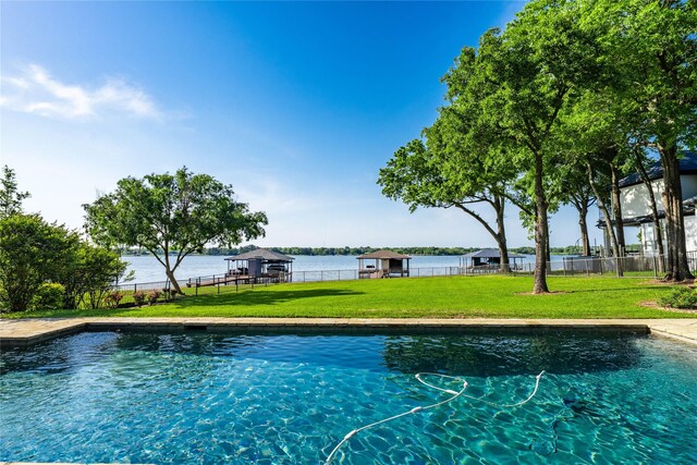 view of pool featuring a gazebo, a fenced in pool, a lawn, and fence