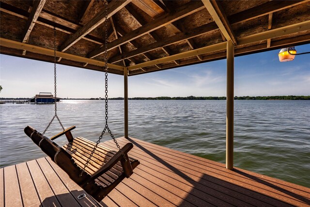 view of dock with a water view