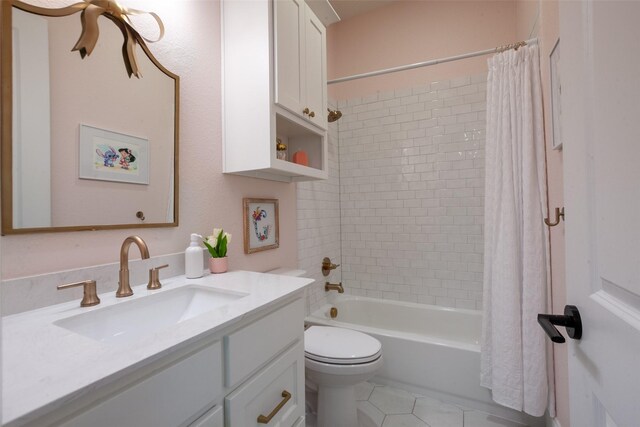 bathroom with vanity, shower / tub combo, tile patterned flooring, and toilet