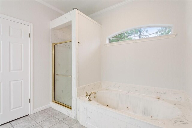 full bathroom featuring tile patterned flooring, a whirlpool tub, crown molding, and a stall shower