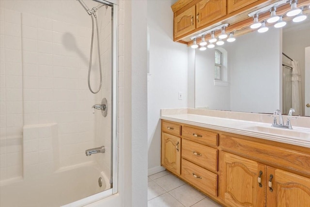 full bathroom with vanity, tile patterned flooring, and shower / tub combination