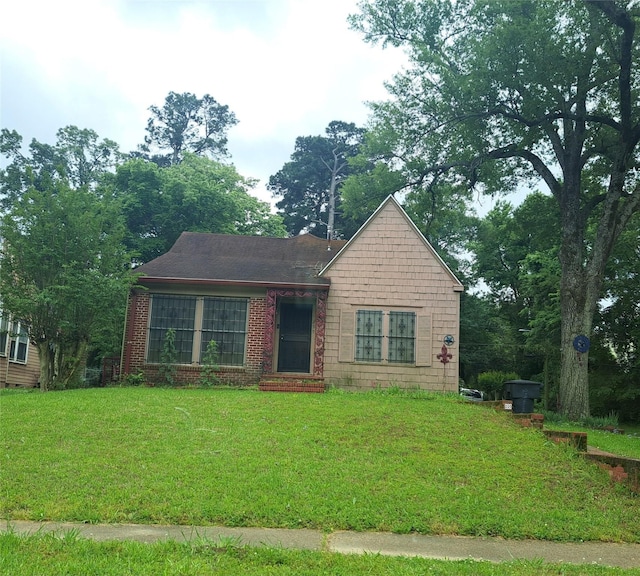 259 Merrick St, Shreveport, LA 71104 - view of front facade with a front yard