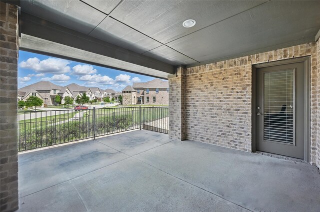 view of patio with a residential view
