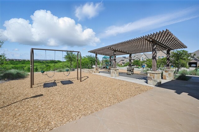 exterior space featuring a pergola and playground community