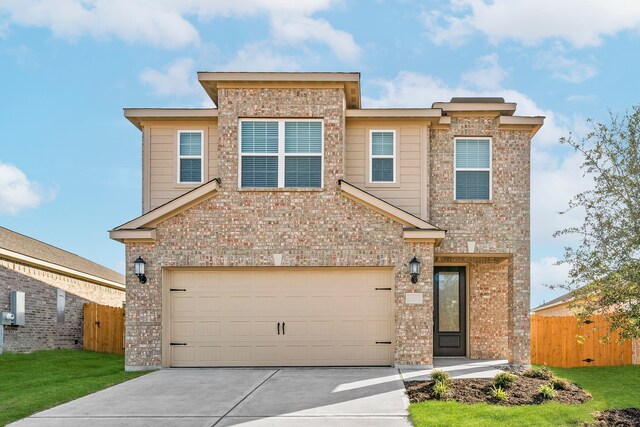 view of front of house featuring fence, brick siding, and concrete driveway