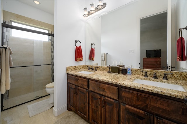 8636 Morgan Rd, Blue Ridge, TX 75424 - full bathroom with double vanity, a shower stall, toilet, and tile patterned floors