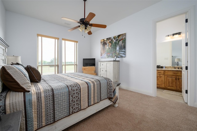 8636 Morgan Rd, Blue Ridge, TX 75424 - bedroom featuring light colored carpet, connected bathroom, a ceiling fan, and baseboards