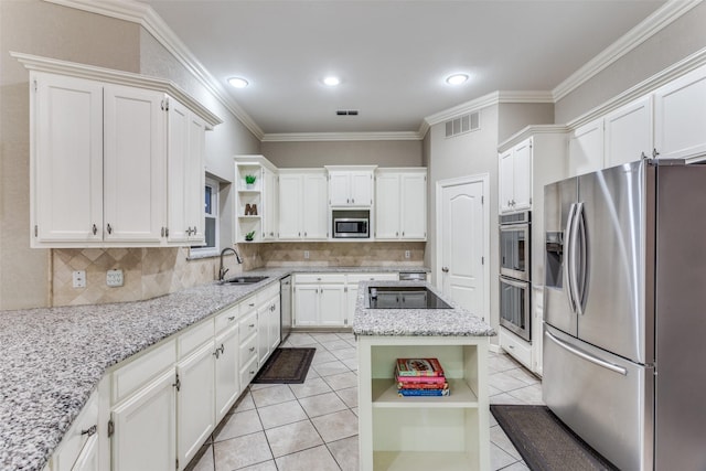 7021 Castle Creek Ct, Fort Worth, TX 76132 - kitchen featuring appliances with stainless steel finishes, open shelves, a sink, and light tile patterned floors