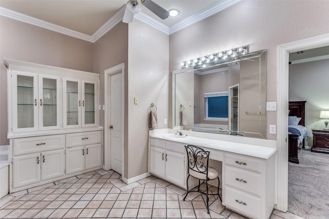 7021 Castle Creek Ct, Fort Worth, TX 76132 - full bathroom featuring tile patterned floors, ensuite bathroom, a ceiling fan, crown molding, and vanity