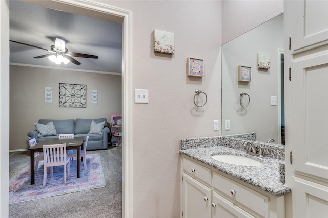 7021 Castle Creek Ct, Fort Worth, TX 76132 - bathroom with a ceiling fan, vanity, and crown molding