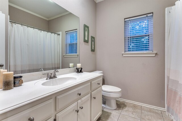 7021 Castle Creek Ct, Fort Worth, TX 76132 - bathroom with tile patterned floors, toilet, baseboards, crown molding, and vanity