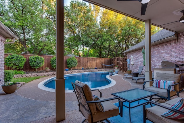 7021 Castle Creek Ct, Fort Worth, TX 76132 - view of pool featuring a patio area, a ceiling fan, a fenced backyard, grilling area, and a fenced in pool