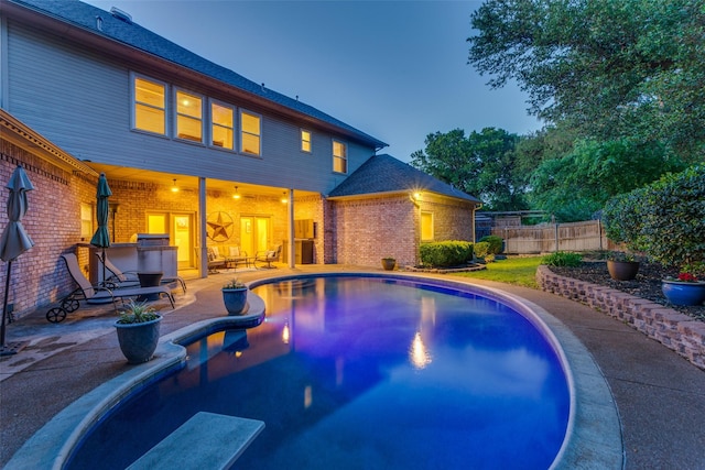 7021 Castle Creek Ct, Fort Worth, TX 76132 - view of swimming pool featuring a patio area, a fenced in pool, and fence
