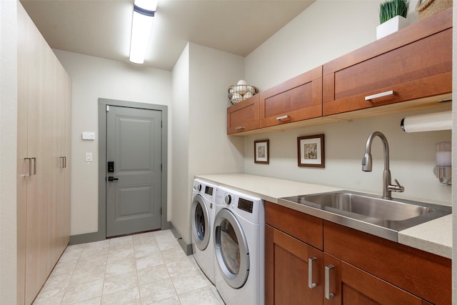 1228 Miller Rd, Melissa, TX 75454 - clothes washing area featuring light tile patterned floors, cabinet space, washer and clothes dryer, and a sink