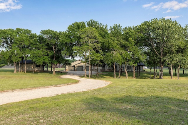 1228 Miller Rd, Melissa, TX 75454 - view of community featuring a lawn, driveway, and a detached garage