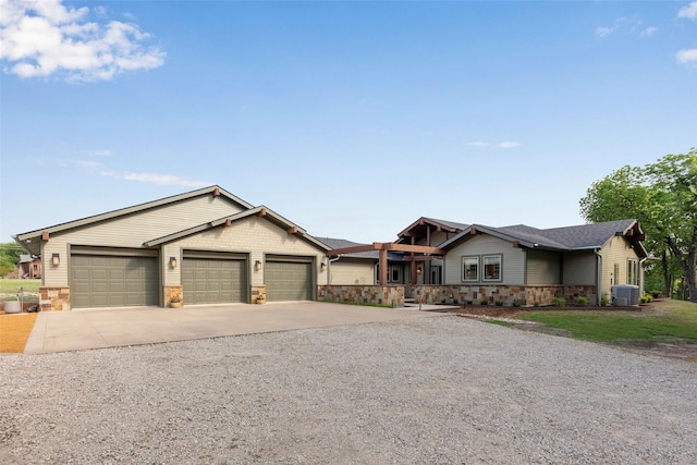 1228 Miller Rd, Melissa, TX 75454 - ranch-style house with stone siding, a garage, central AC, and concrete driveway