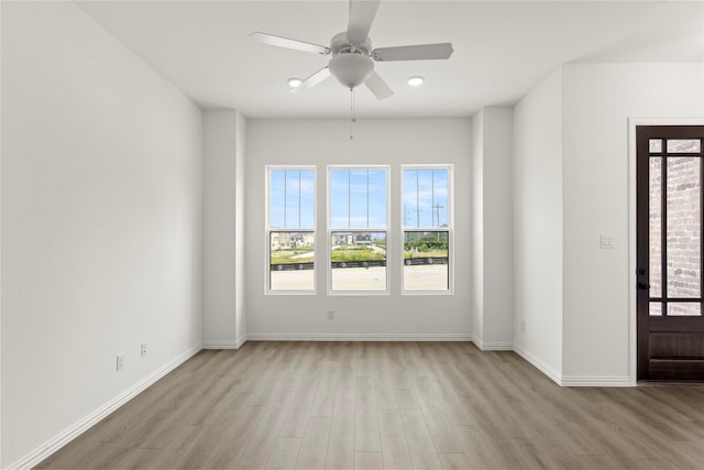 917 Janwood Dr, Plano, TX 75075 - entryway featuring light wood-style floors, a ceiling fan, and baseboards