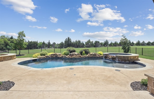 view of swimming pool featuring a patio area, a fenced backyard, a fenced in pool, and an in ground hot tub