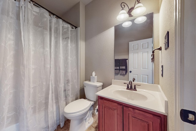 4001 Dellman Dr, Fort Worth, TX 76262 - full bath with a textured wall, toilet, and vanity