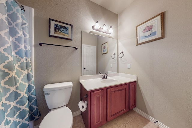 4001 Dellman Dr, Fort Worth, TX 76262 - bathroom with tile patterned floors, toilet, vanity, baseboards, and a shower with shower curtain
